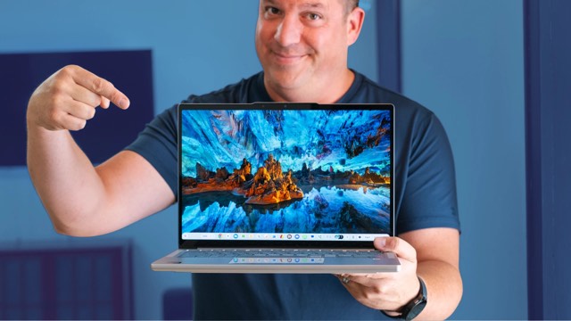 Chrome Unboxed reviewer pointing at a Chromebook
